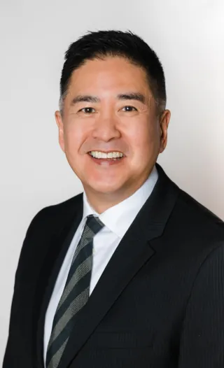 Trevor B Kwok